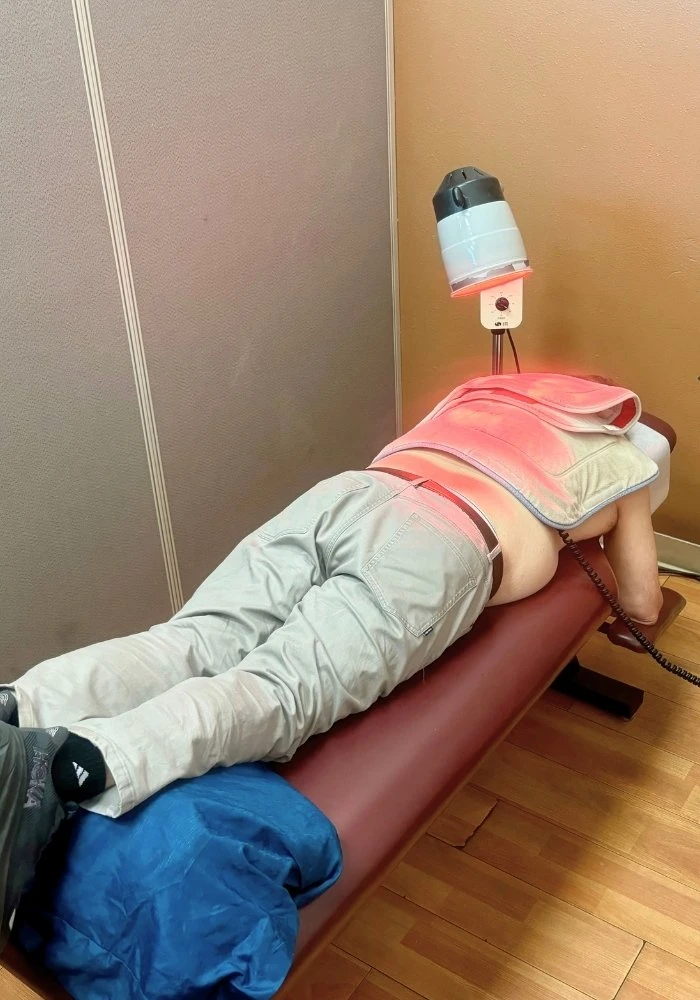 Dr Shoar Performing Red Laser Treatment
